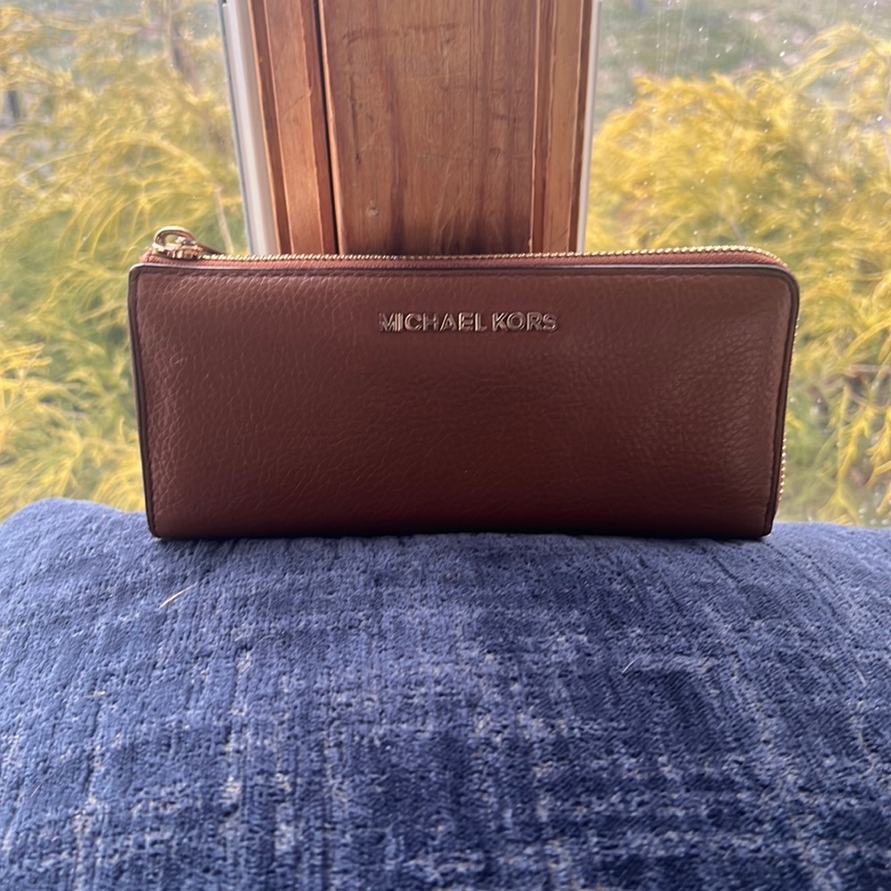 Really cute brown Michael Kors wallet.